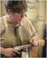 Molly Winton carving wood